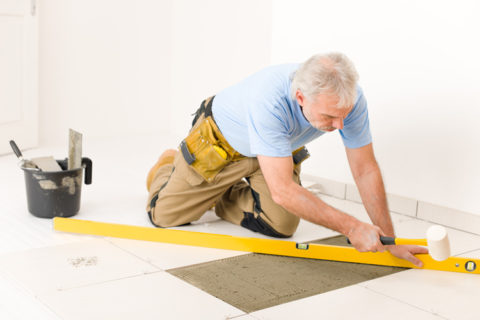 Poseur de carrelage au sol - Fabrication FIMA